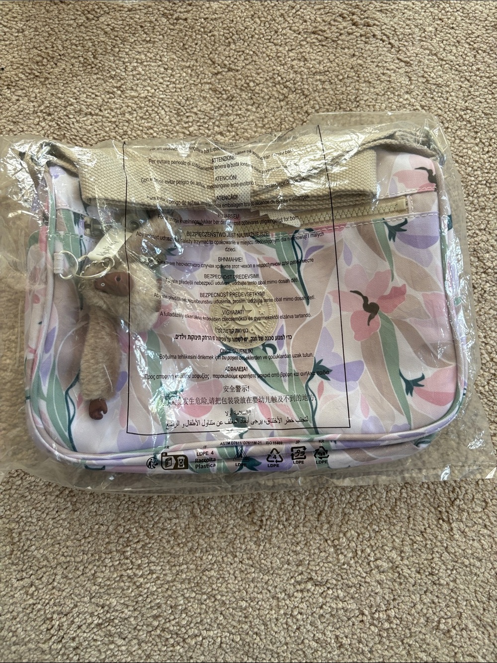 Floral Pastel Crossbody Bag with Plush Charm
